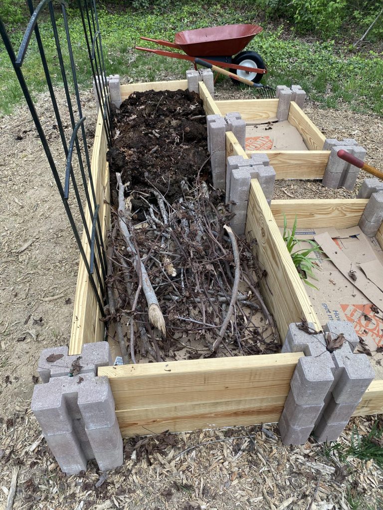 Can I Put Grass Clippings in My Raised Garden Bed